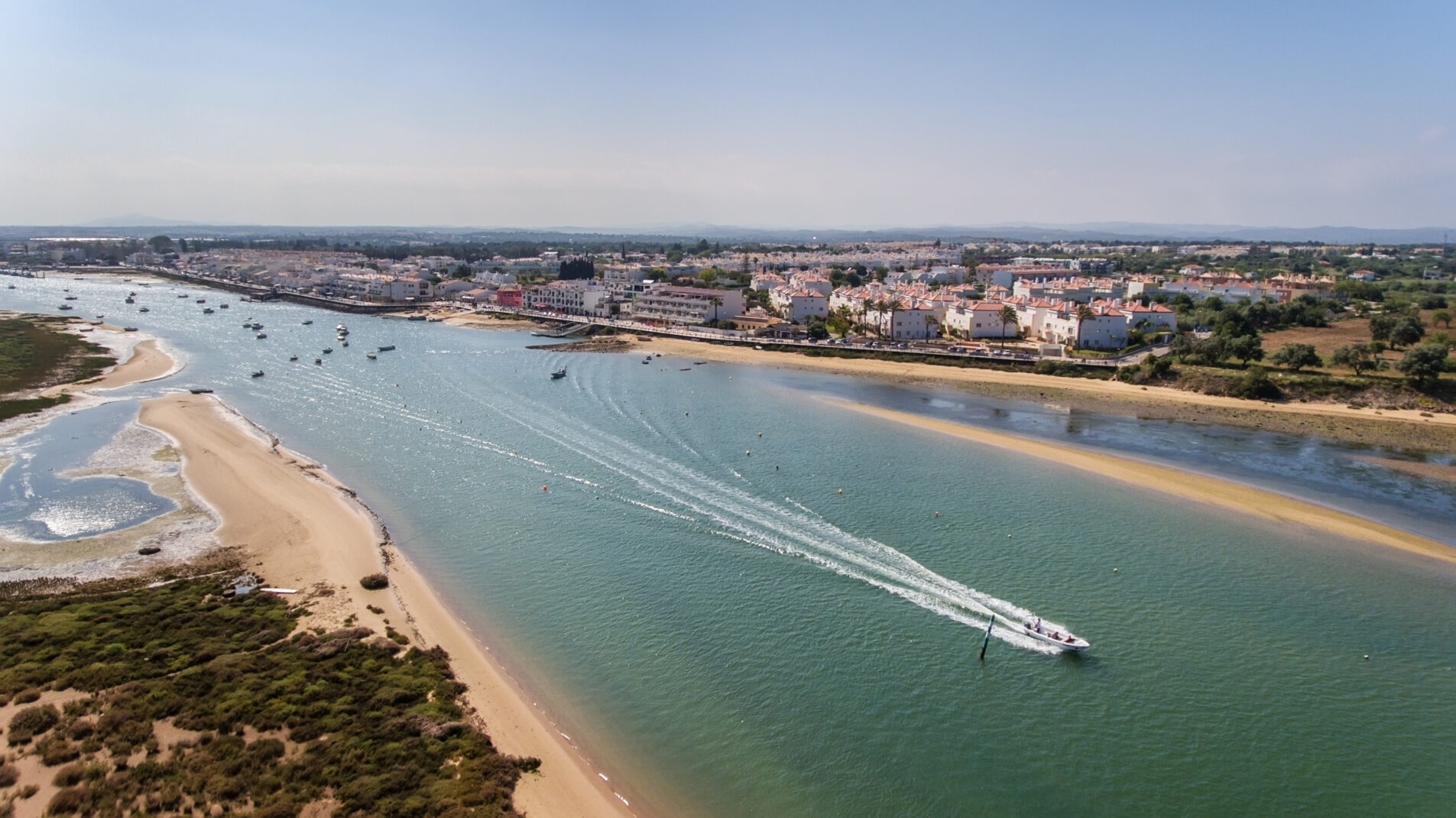 Aerial. Boat on the river Ria Formosa Santa Luzia, Tavira